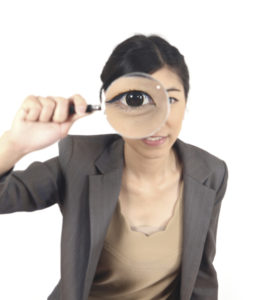 woman magnifying responsive web design